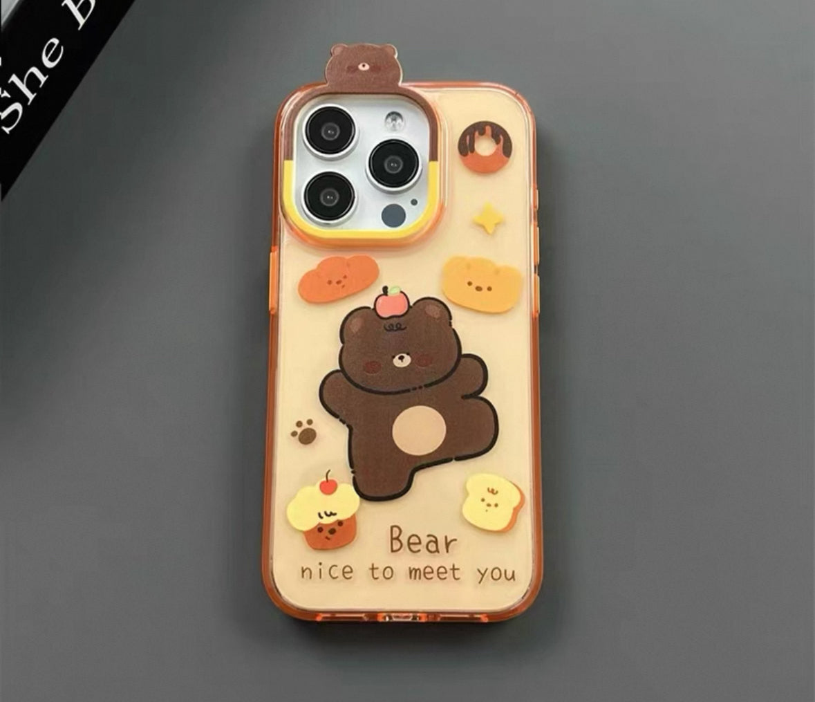 面白いデザインのスイーツと小熊が描かれた、透明なオレンジ色のスマホケース ( Translucent orange phone case featuring an amusing design of desserts and little bears)(SJK094)