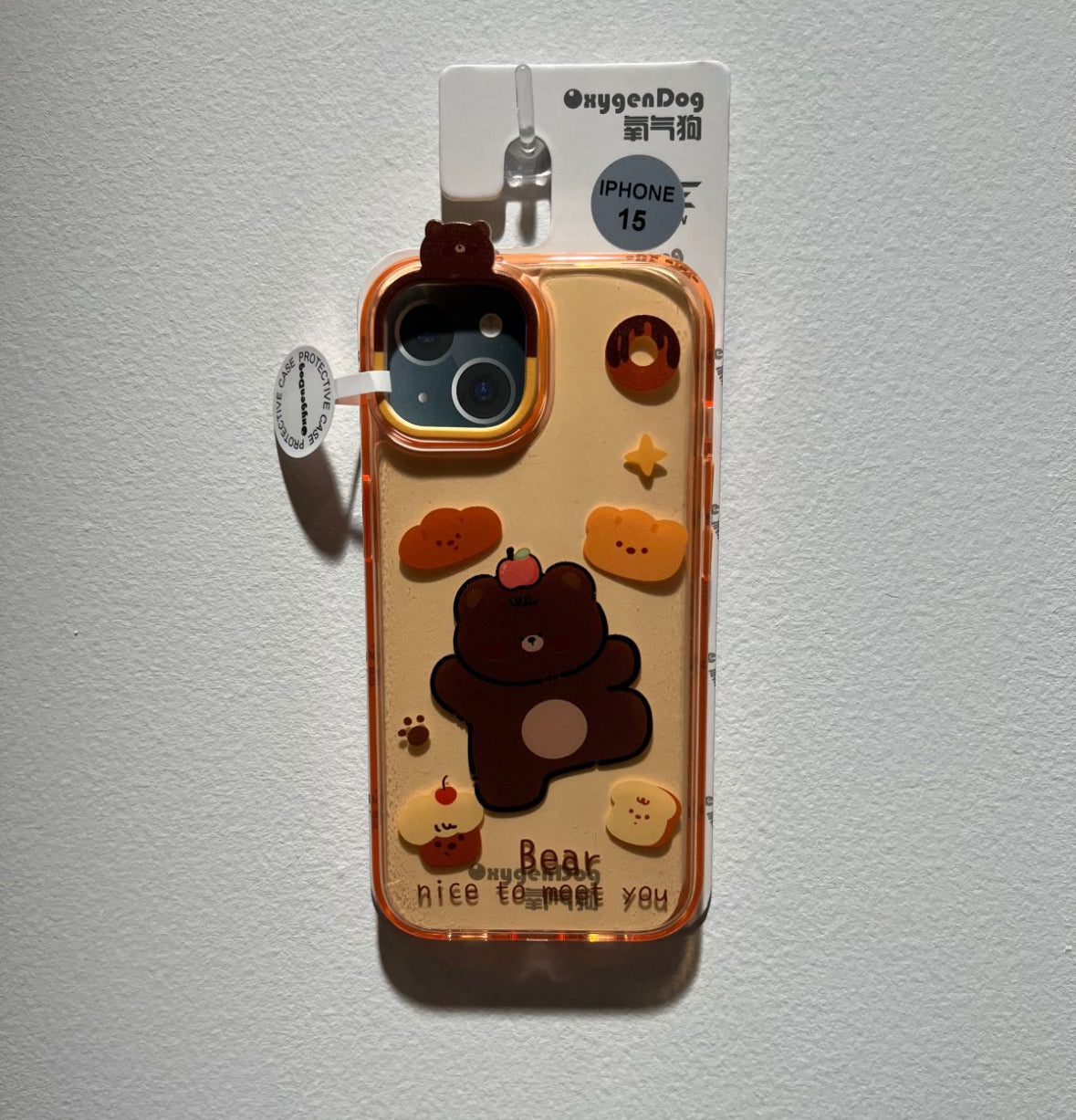 面白いデザインのスイーツと小熊が描かれた、透明なオレンジ色のスマホケース ( Translucent orange phone case featuring an amusing design of desserts and little bears)(SJK094)