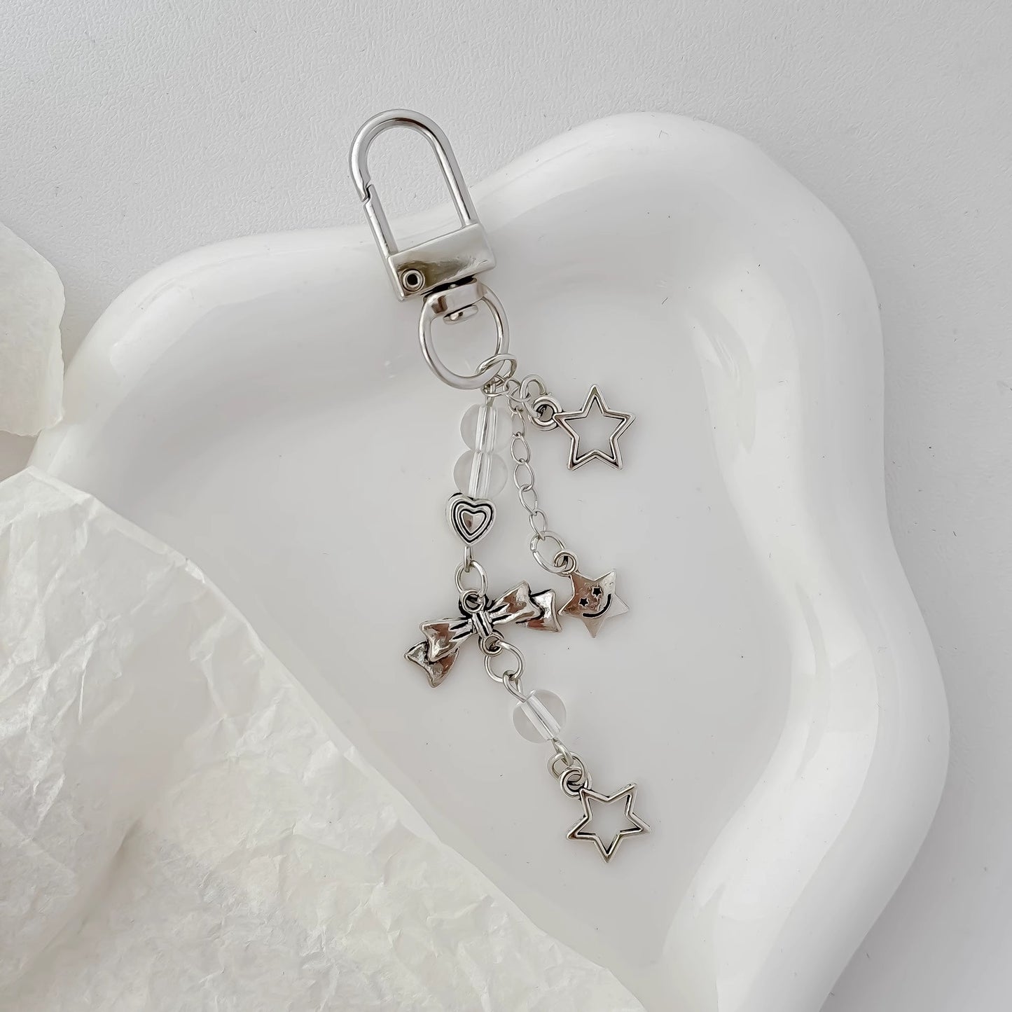 シルバーリボンのストラップですSilver bow pendant