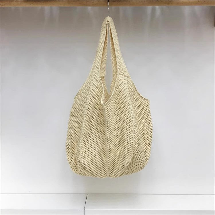 手編みバッグカジュアルな怠惰な風赤い大きなバッグの肩のバッグですHandcrafted hollowed-out woven bag, casual and laid-back style red large single-shoulder bag