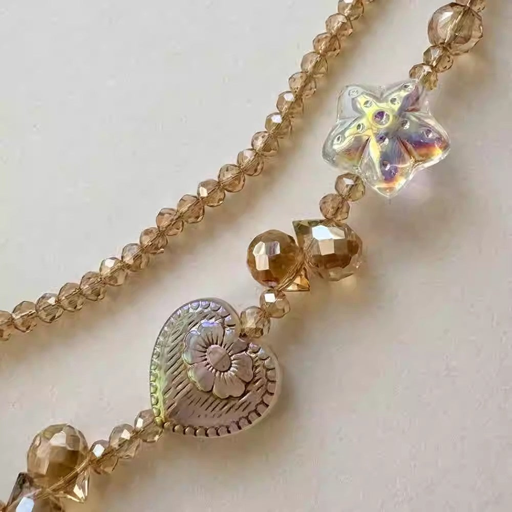 シャンパンカラーのダブルチェーン携帯電話のストラップですChampagne-colored double-layer chain mobile phone lanyard