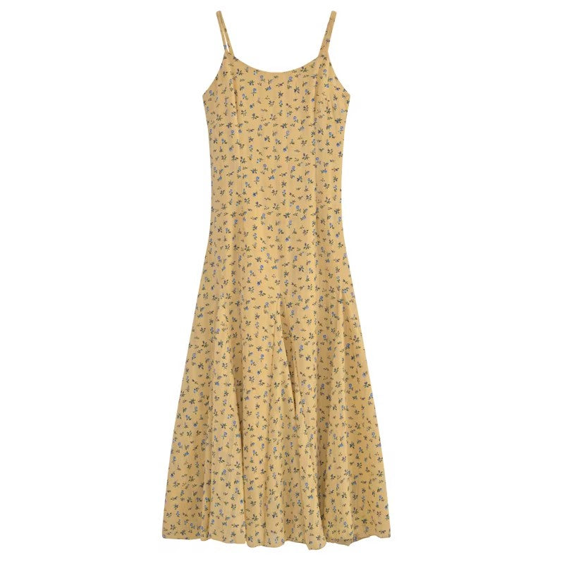 黄色い花柄のキャミソールワンピースですYellow floral halter dress
