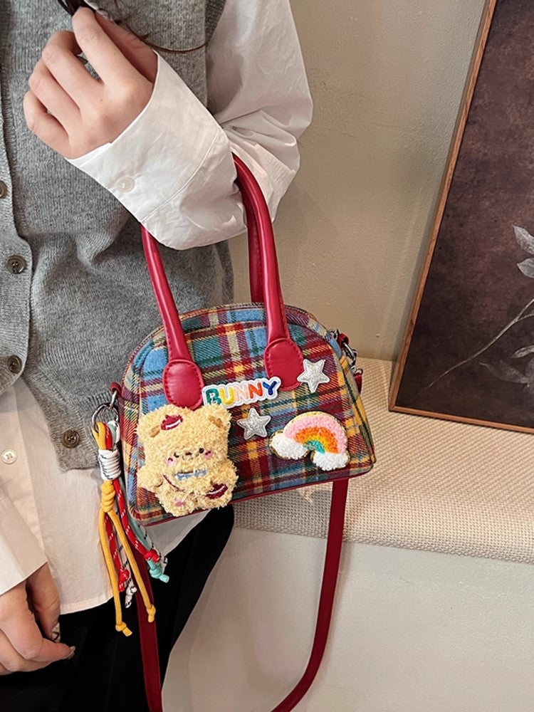 チェック柄の貝殻バッグカジュアルなショルダーバッグが登場しましたNew fashionable checkered fabric shell bag and casual single-shoulder crossbody bag