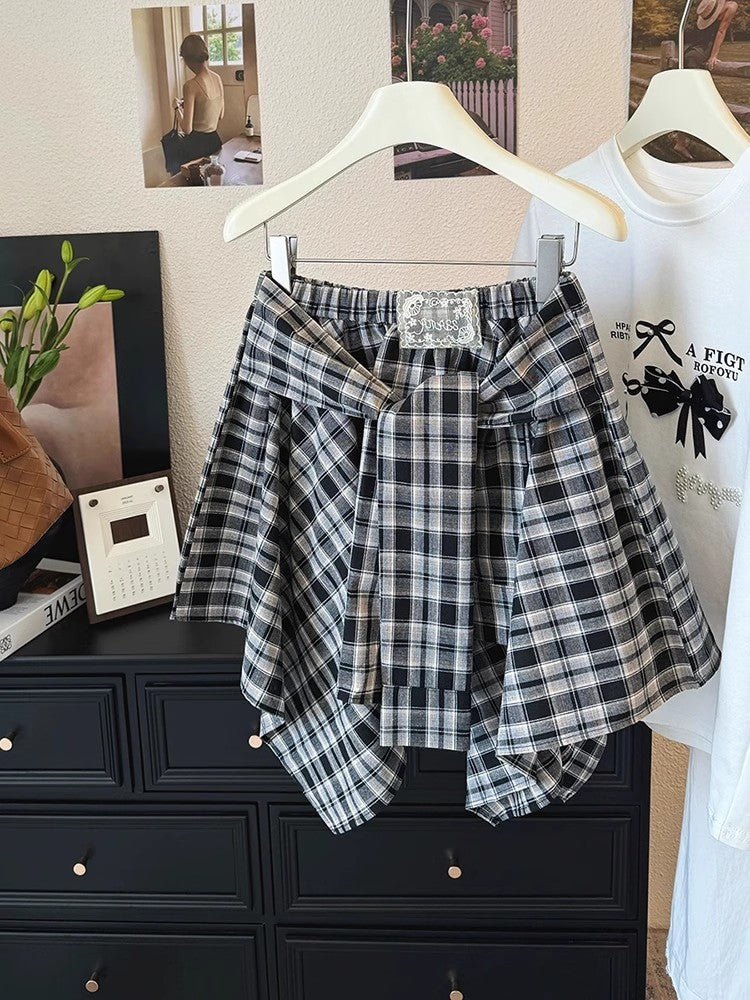 チェックのスカートIrregular plaid skirt