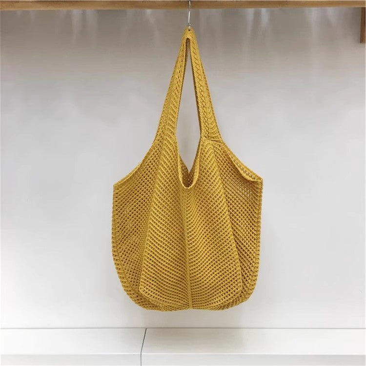 手編みバッグカジュアルな怠惰な風赤い大きなバッグの肩のバッグですHandcrafted hollowed-out woven bag, casual and laid-back style red large single-shoulder bag