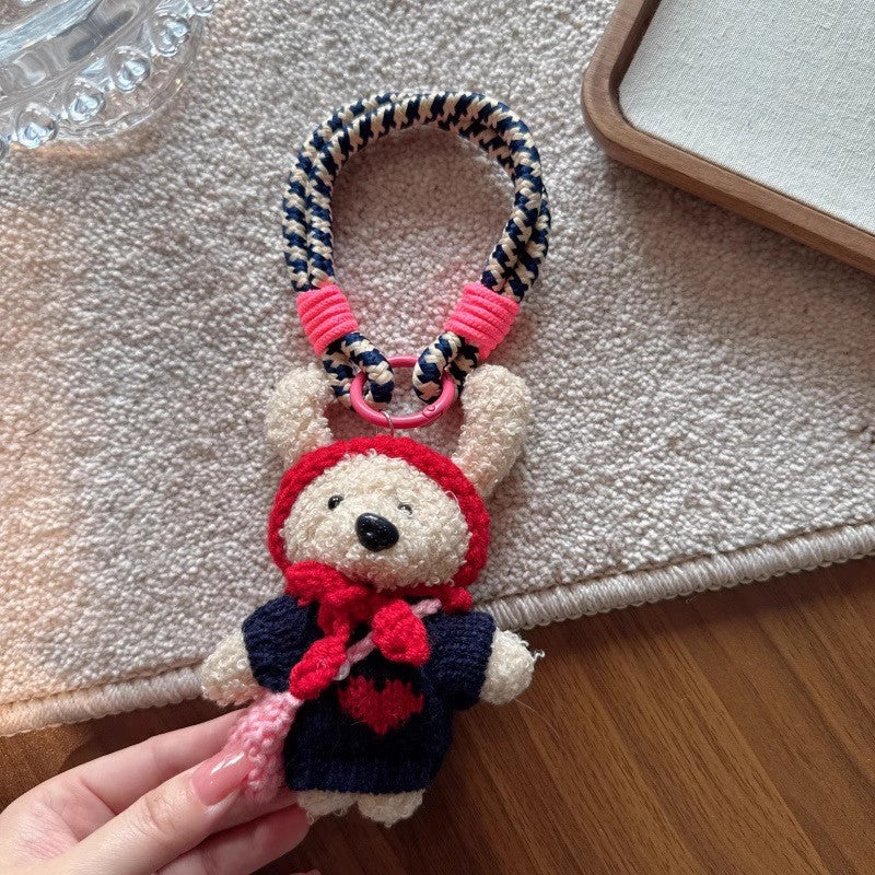 カラフルなひものニット帽のクマさんですLittle bear with colorful rope and woolen hat
