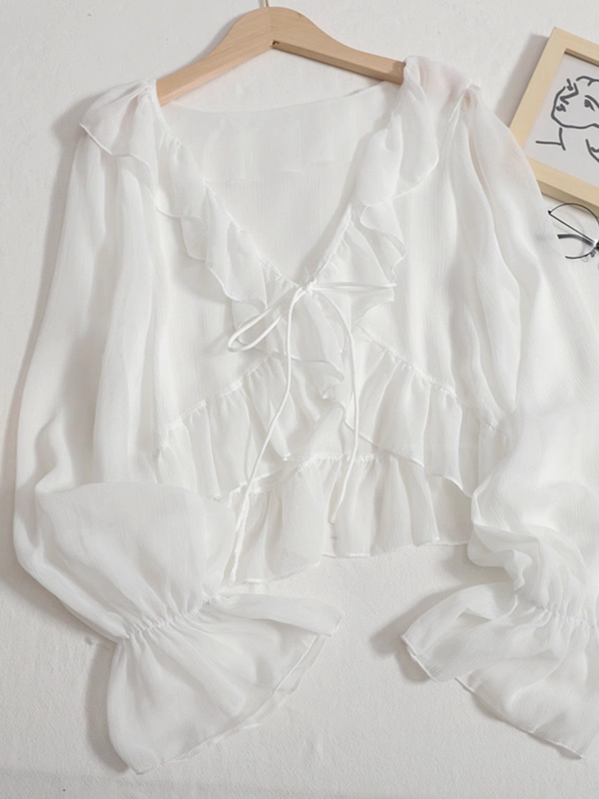 日焼け止めカーディガンの薄手タイプですSunscreen, light cardigan.