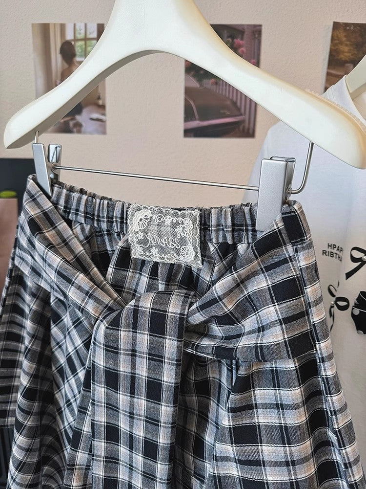 チェックのスカートIrregular plaid skirt