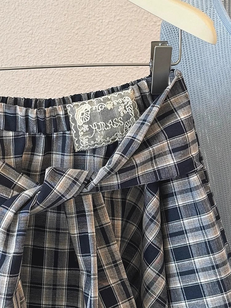 チェックのスカートIrregular plaid skirt