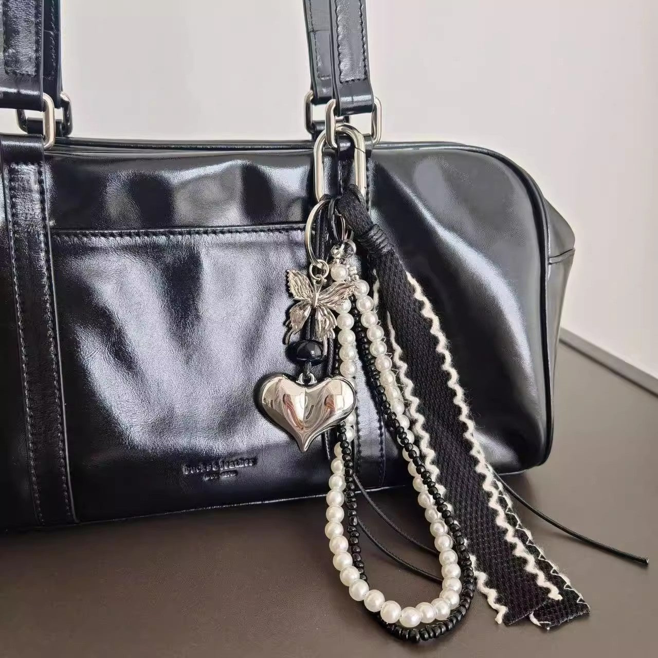 ハートパールバタフライチャーム(黒)Heart pearl butterfly charm (black)