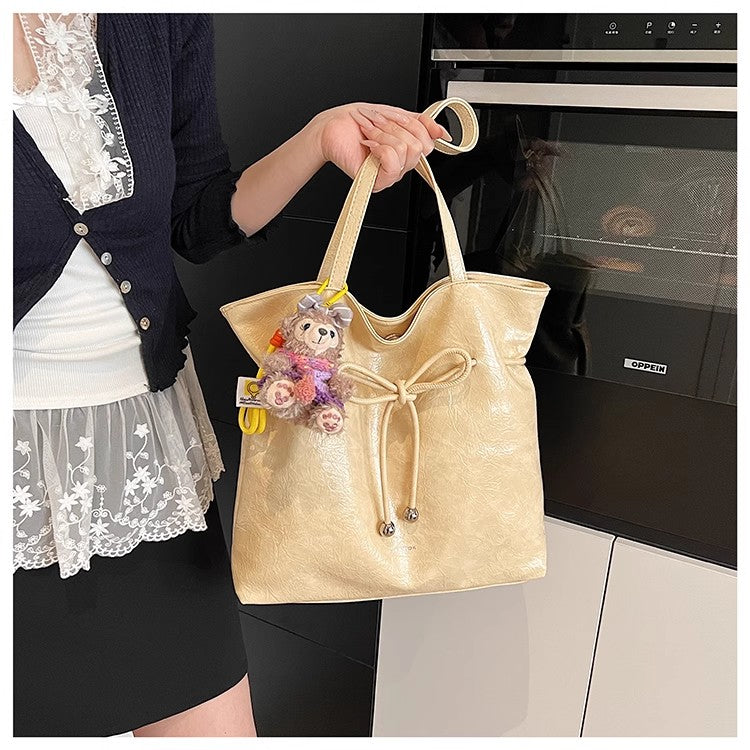 何にでも使えるショルダーバッグが流行で爆発的なトートバッグですThe versatile single-shoulder bag is a popular bestseller, the Tote bucket bag
