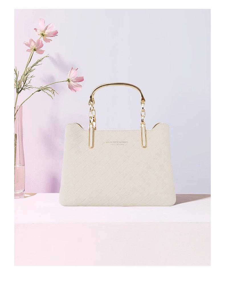 紅谷の女性のバッグ優雅な牛革ハンドバッグですHonggu women's handbag is an elegant cowhide handbag