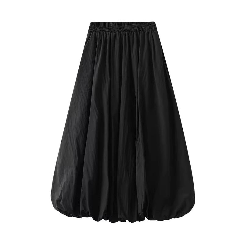 黒いつぼみのスカートですIt's a black bud skirt.