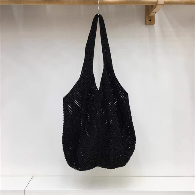 手編みバッグカジュアルな怠惰な風赤い大きなバッグの肩のバッグですHandcrafted hollowed-out woven bag, casual and laid-back style red large single-shoulder bag