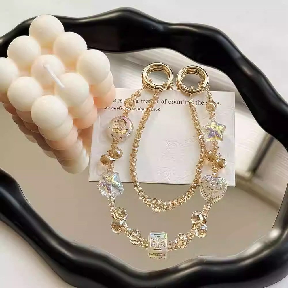 シャンパンカラーのダブルチェーン携帯電話のストラップですChampagne-colored double-layer chain mobile phone lanyard