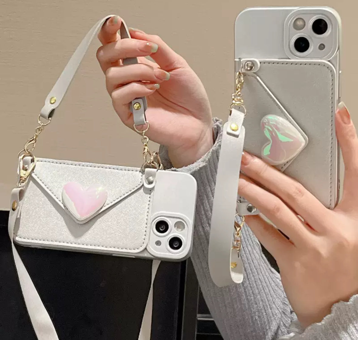 シルバー レーザー ハート形のウリスバンド付きスマホケース（Silver laser heart-shaped wristband phone case）（SJK052）
