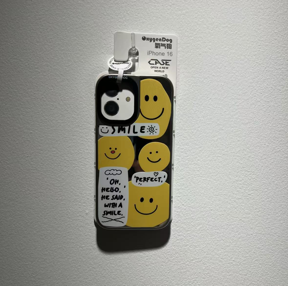 笑顔の鏡面デザインで、ニッチな高級感を備えたスマホケース （Smiling - face mirror - designed phone case with niche and high - end feel）（SJK082）