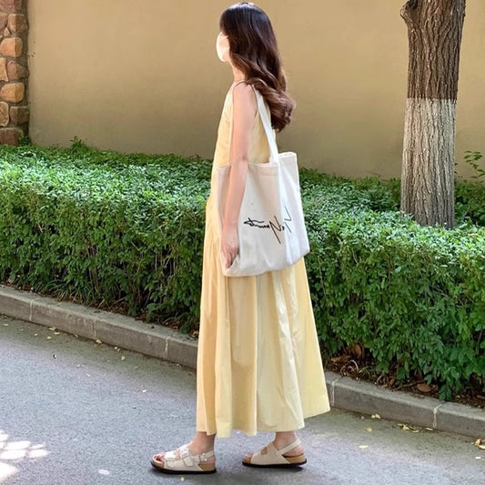 ノースリーブのベストワンピースSleeveless vest dress