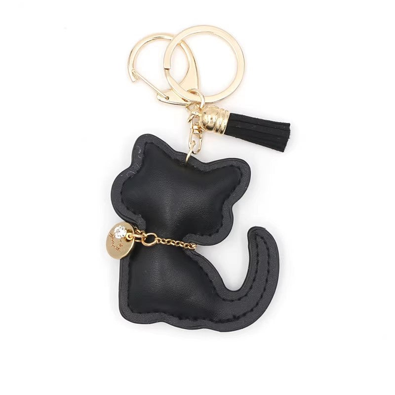 猫ちゃんのストラップPu革ですLittle cat pendant made of Pu leather