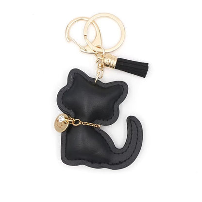 猫ちゃんのストラップPu革ですLittle cat pendant made of Pu leather
