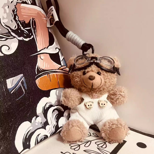 サスペンダーパンツフライヤーくまチャームSuspender pants flyer bear charm (white suspender pants, space megane-brown bear)