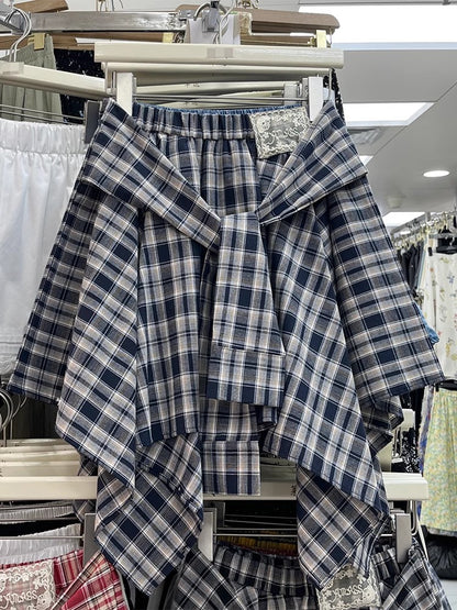 チェックのスカートIrregular plaid skirt