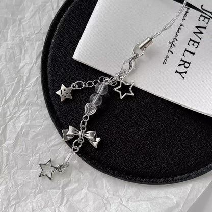 シルバーリボンのストラップですSilver bow pendant