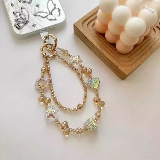 シャンパンカラーのダブルチェーン携帯電話のストラップですChampagne-colored double-layer chain mobile phone lanyard