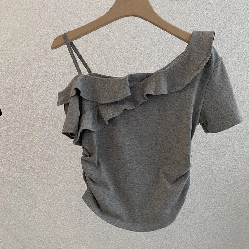 ほっそりしたシワの短い上着ですSlimming pleated short top