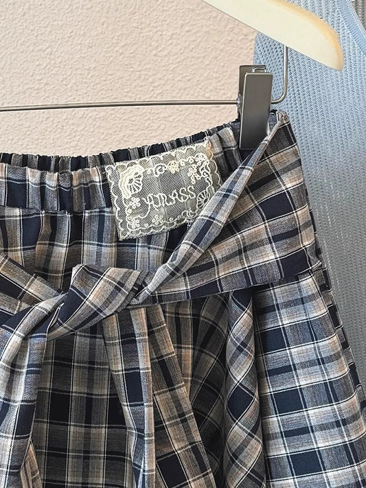 チェックのスカートIrregular plaid skirt