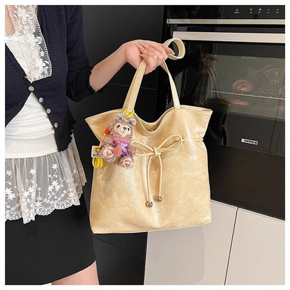 何にでも使えるショルダーバッグが流行で爆発的なトートバッグですThe versatile single-shoulder bag is a popular bestseller, the Tote bucket bag