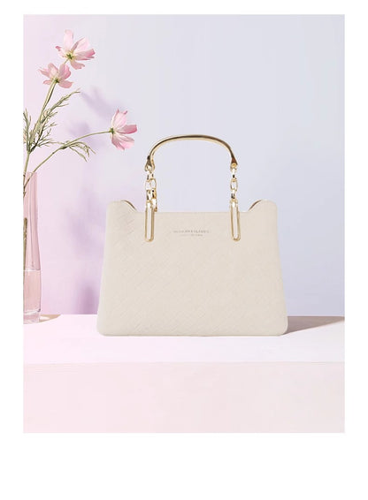 紅谷の女性のバッグ優雅な牛革ハンドバッグですHonggu women's handbag is an elegant cowhide handbag