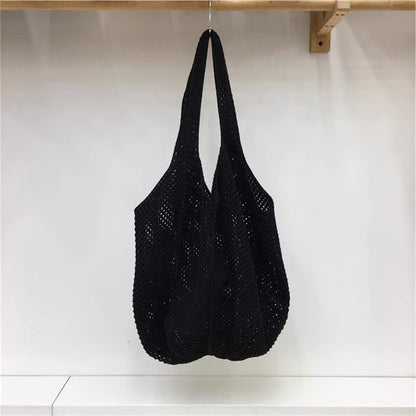 手編みバッグカジュアルな怠惰な風赤い大きなバッグの肩のバッグですHandcrafted hollowed-out woven bag, casual and laid-back style red large single-shoulder bag