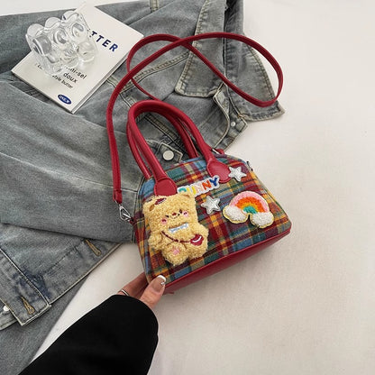 チェック柄の貝殻バッグカジュアルなショルダーバッグが登場しましたNew fashionable checkered fabric shell bag and casual single-shoulder crossbody bag
