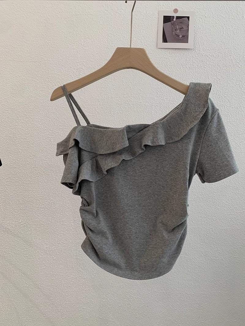 ほっそりしたシワの短い上着ですSlimming pleated short top