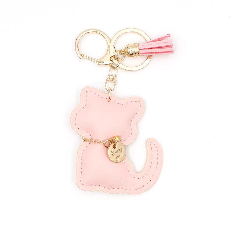 猫ちゃんのストラップPu革ですLittle cat pendant made of Pu leather