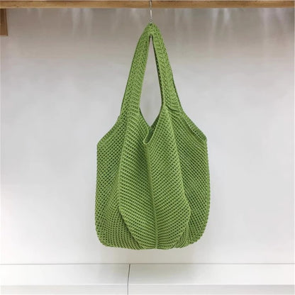 手編みバッグカジュアルな怠惰な風赤い大きなバッグの肩のバッグですHandcrafted hollowed-out woven bag, casual and laid-back style red large single-shoulder bag